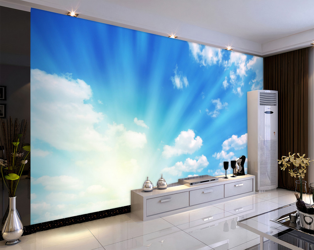 Fototapeta jasne promienie słońca na błękitnym niebie