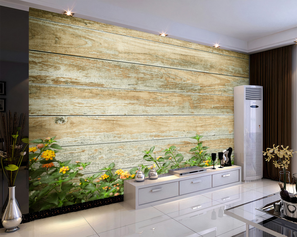 Fototapeta żółte kwiaty z zielenią na parkietowym tle