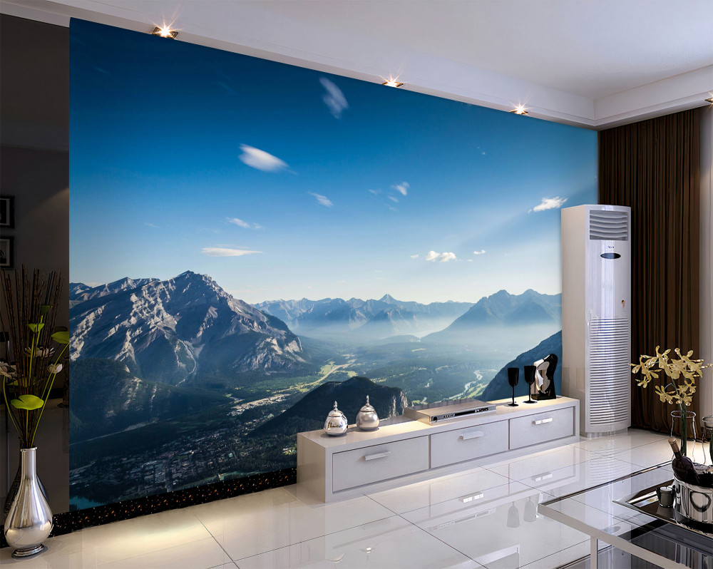 Fototapeta rozległe błękitne niebo znad szczytów gór