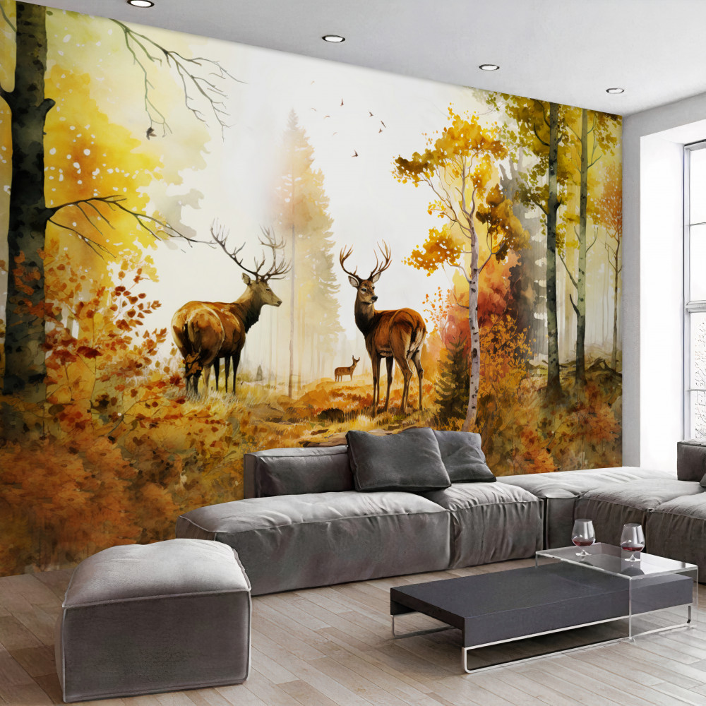 Fototapeta jeleń spaceruje po jesiennym lesie