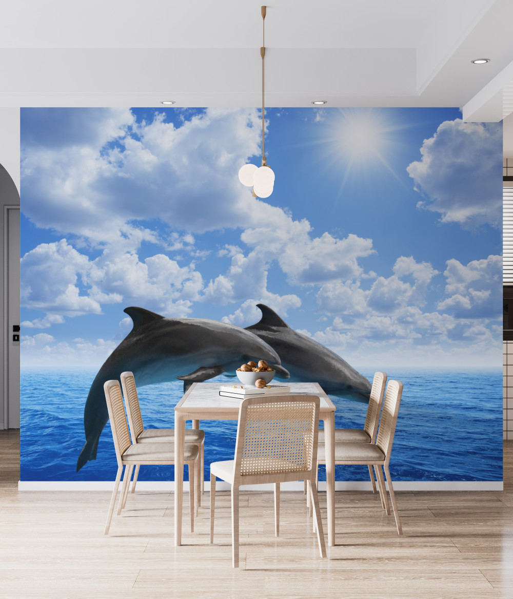 Fototapeta delfiny skaczą nad wodą
