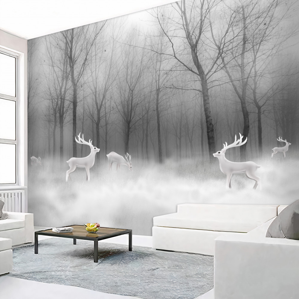 Fototapeta stado jeleni spaceruje po mglistym lesie