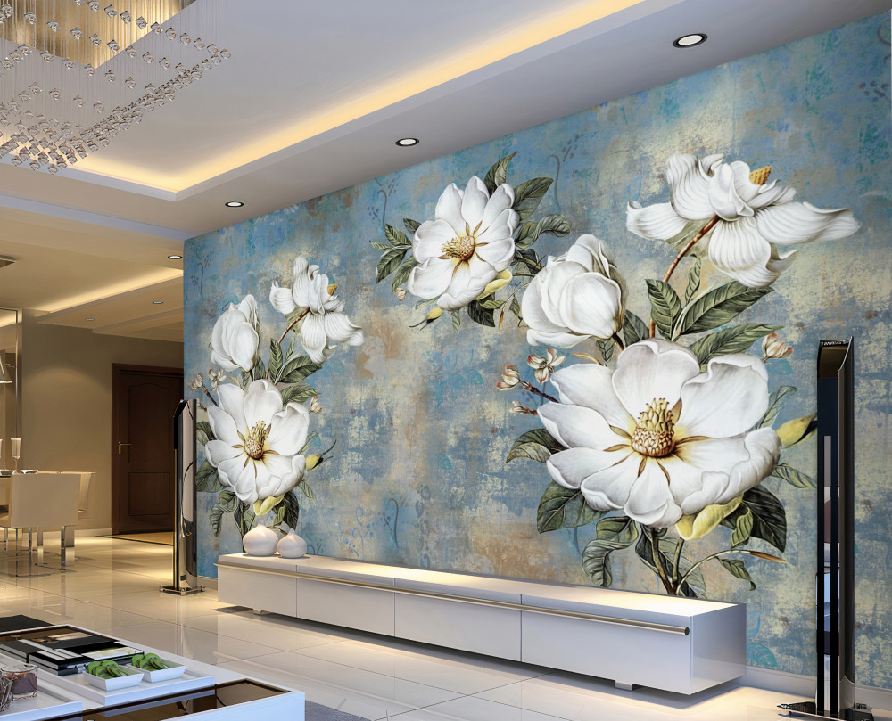 Fototapeta białe kwiaty na pomalowanej betonowej ścianie