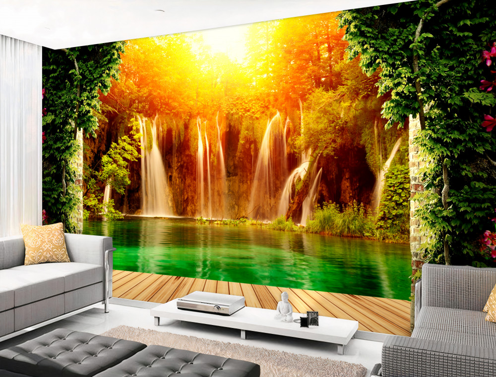 Fototapeta niesamowity zachód słońca nad spadającym wodospadem