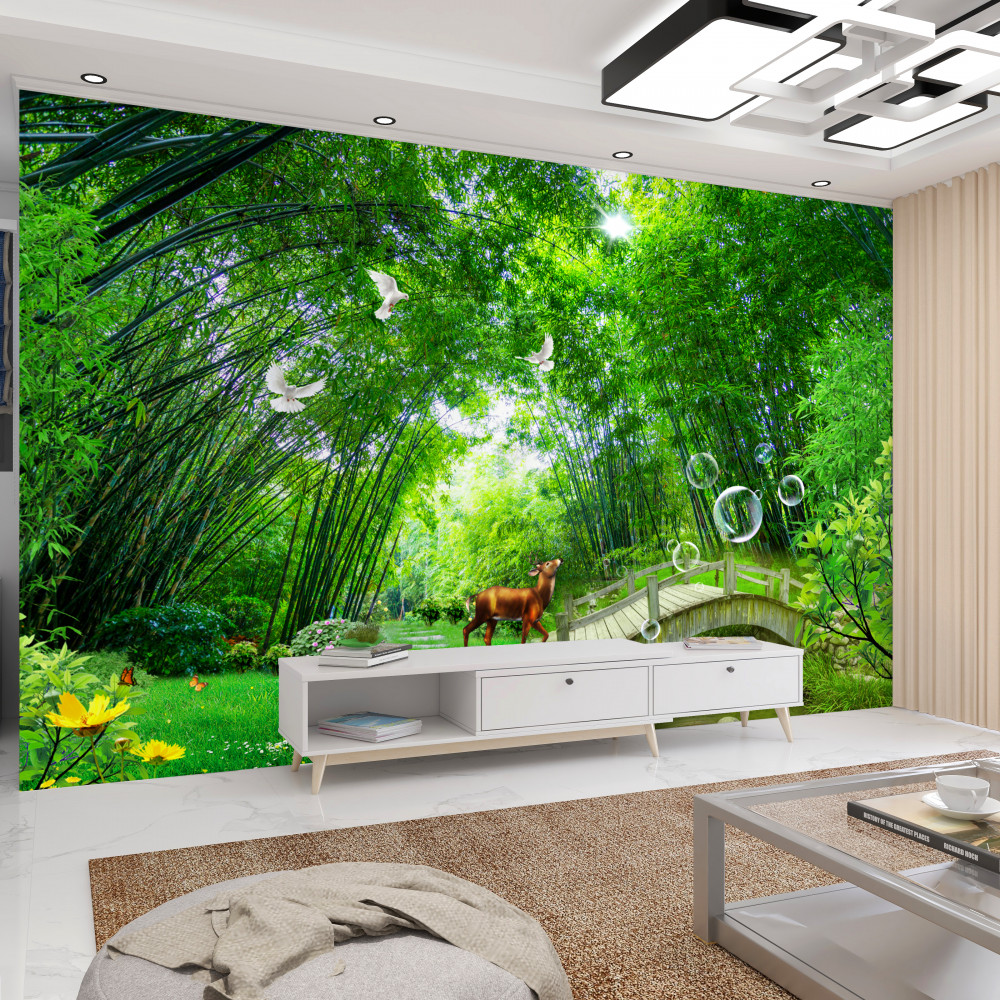 Fototapeta jeleń przechodzi przez drewniany most w zielonym lesie