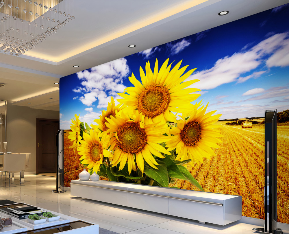 Fototapeta bukiet słoneczników na tle nieba i pola pszenicy