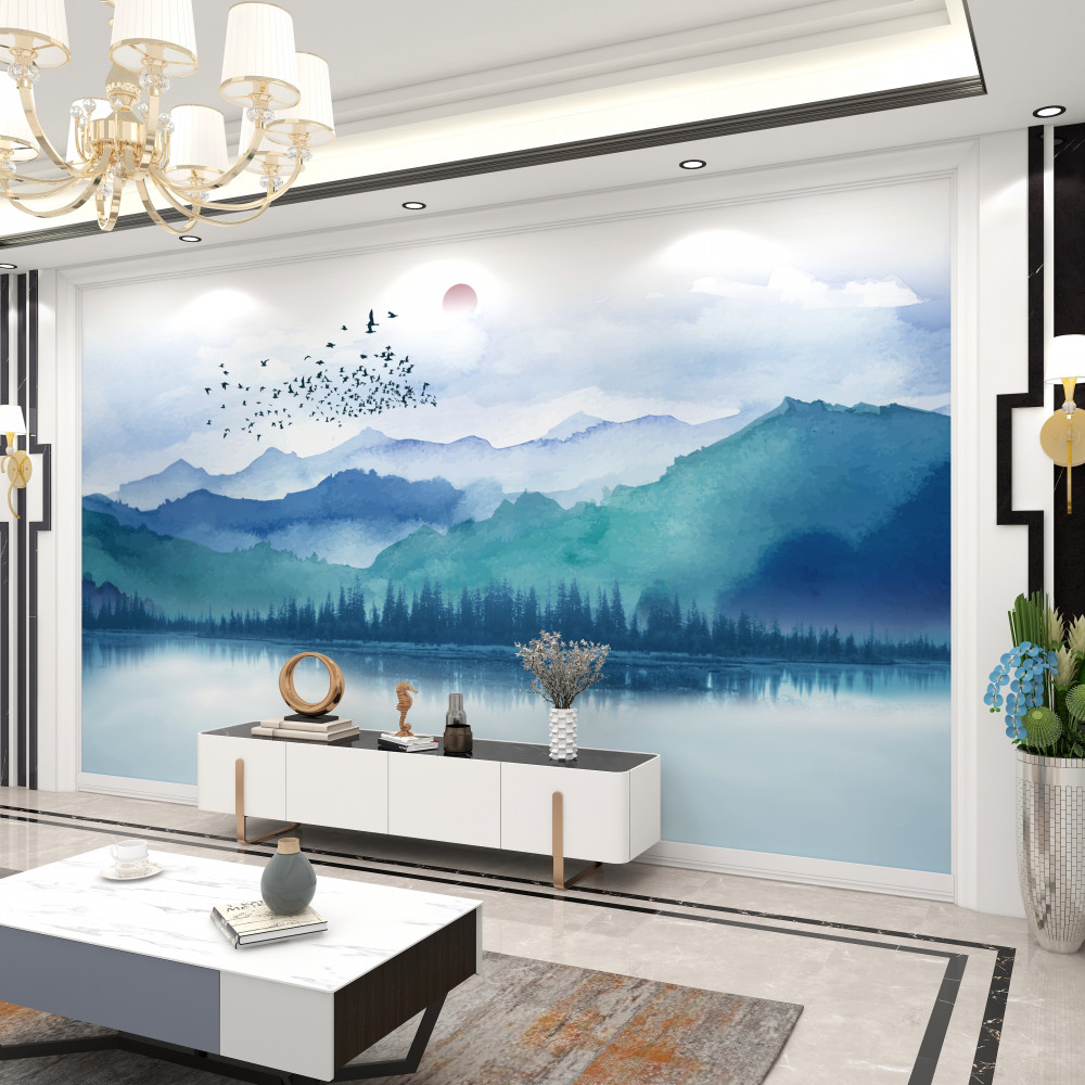 Fototapeta stado ptaków leci nad górskim jeziorem o zachodzie słońca