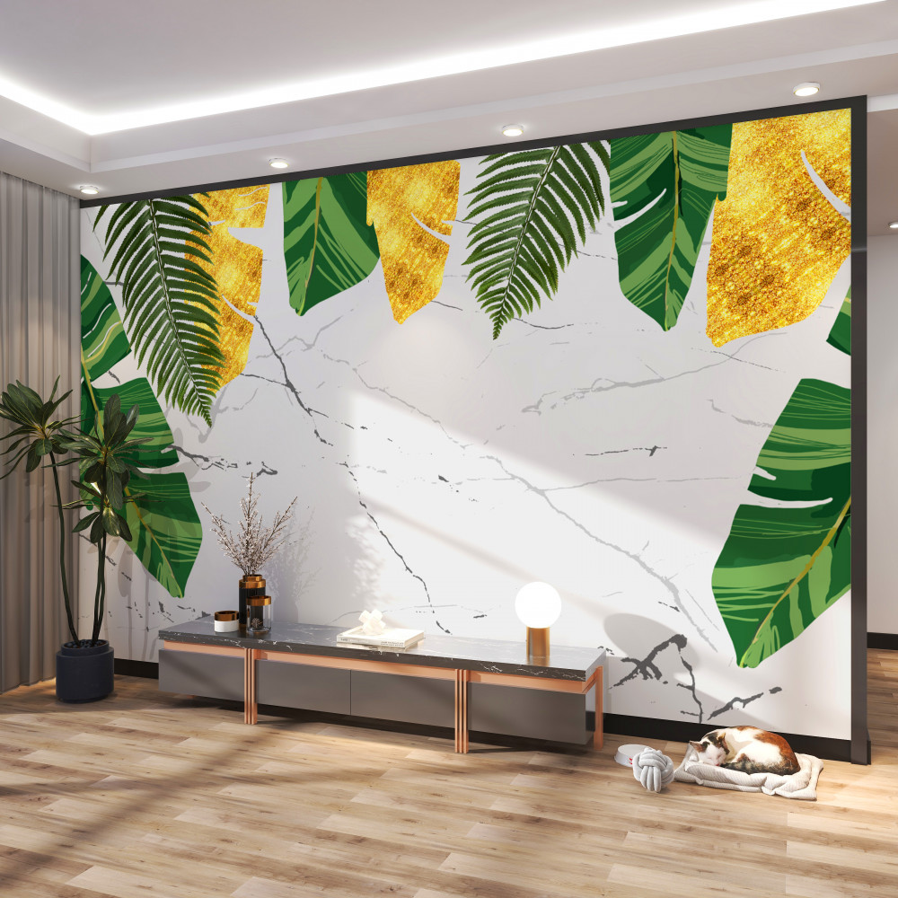 Fototapeta zielone i żółte liście na białym marmurze