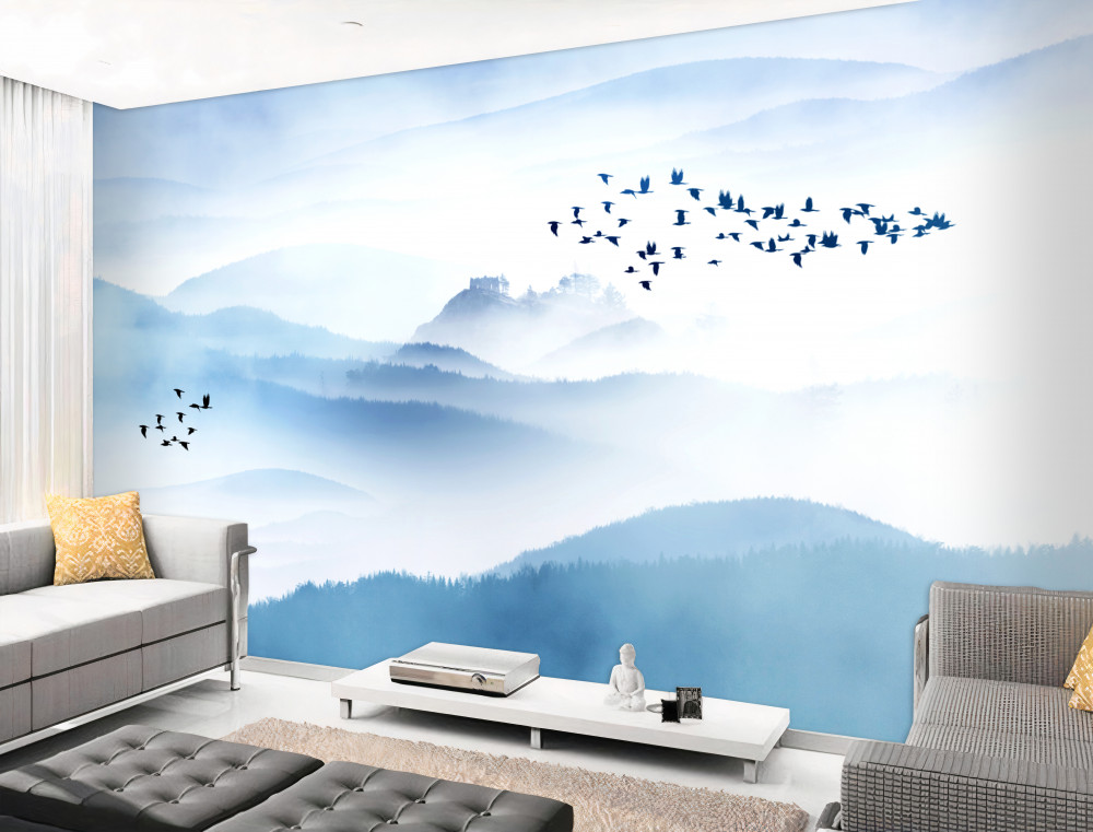 Fototapeta stada ptaków przelatują nad mglistymi górami