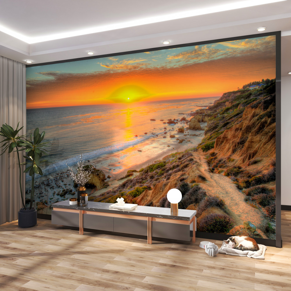 Fototapeta zachód słońca wchodząc do morza