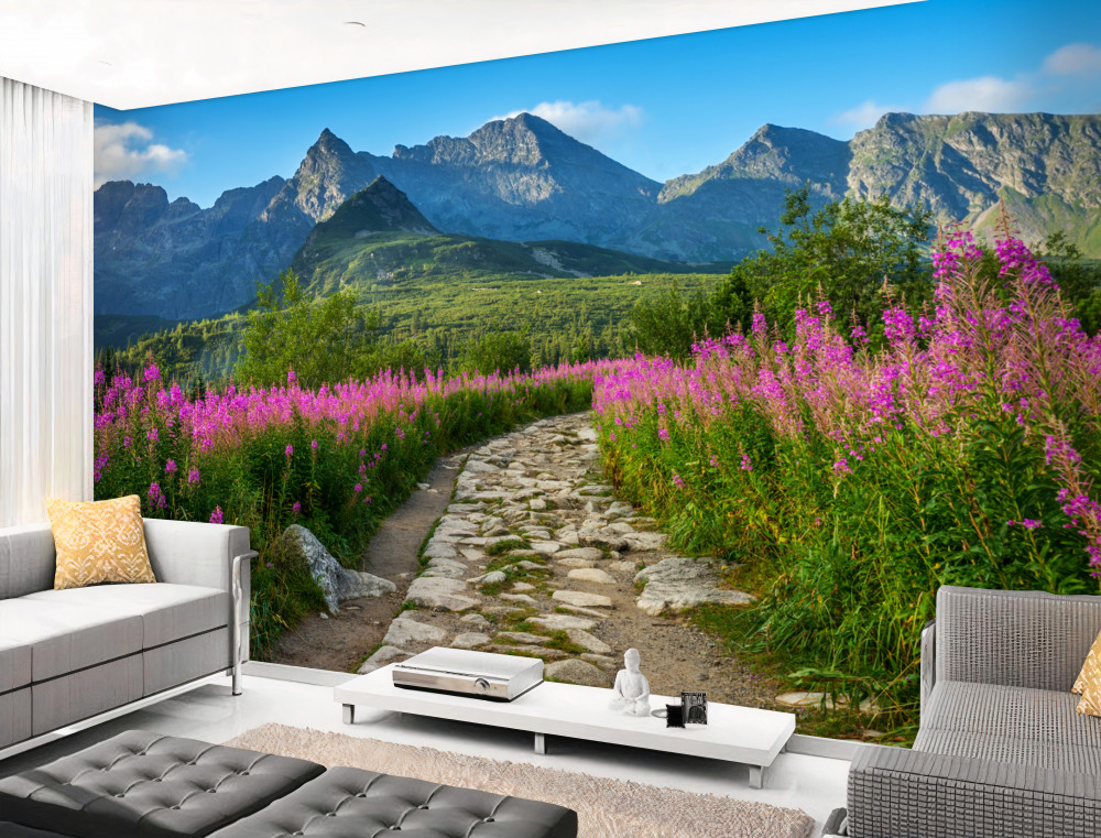 Fototapeta ścieżka wśród kwiecistej łąki w górach