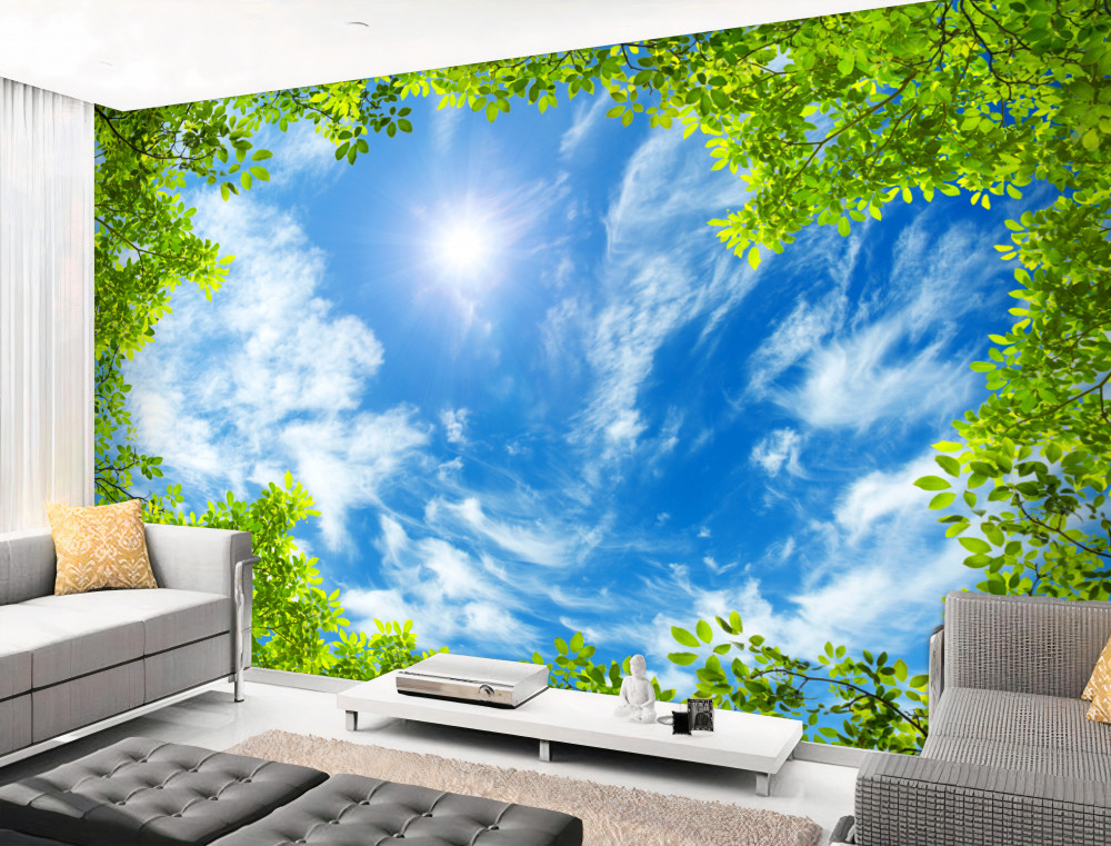 Fototapeta błękitne niebo i słońce otoczone zielenią