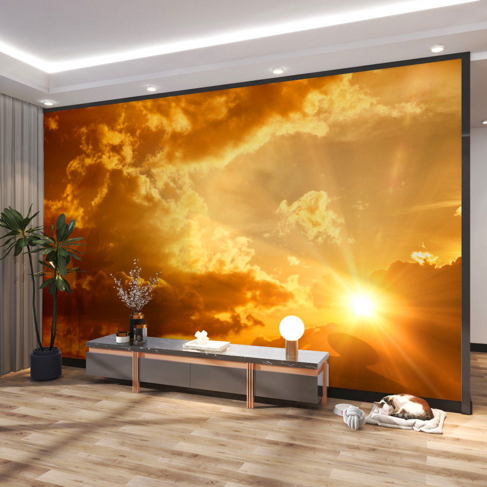 Fototapeta ciepłe promienie zachodzącego słońca przez chmury