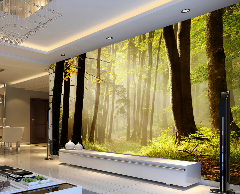 Fototapeta promienie porannego słońca przebijają się przez leśną mgłę