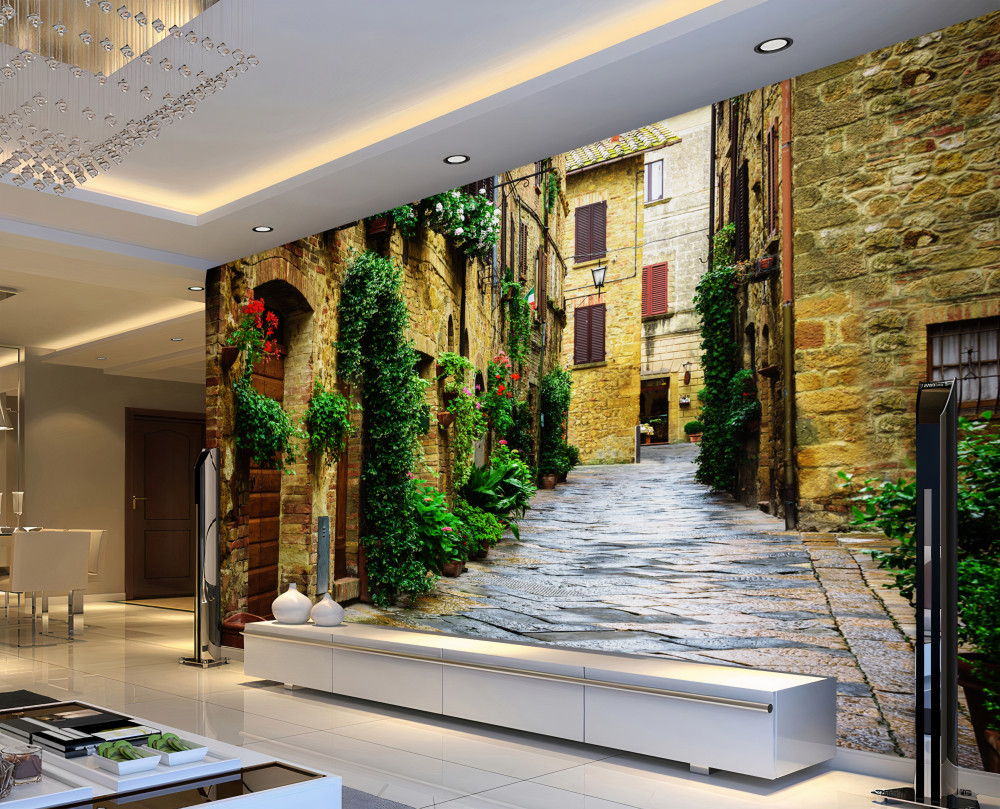 Fototapeta stara kamienna ulica w zielonych roślinach