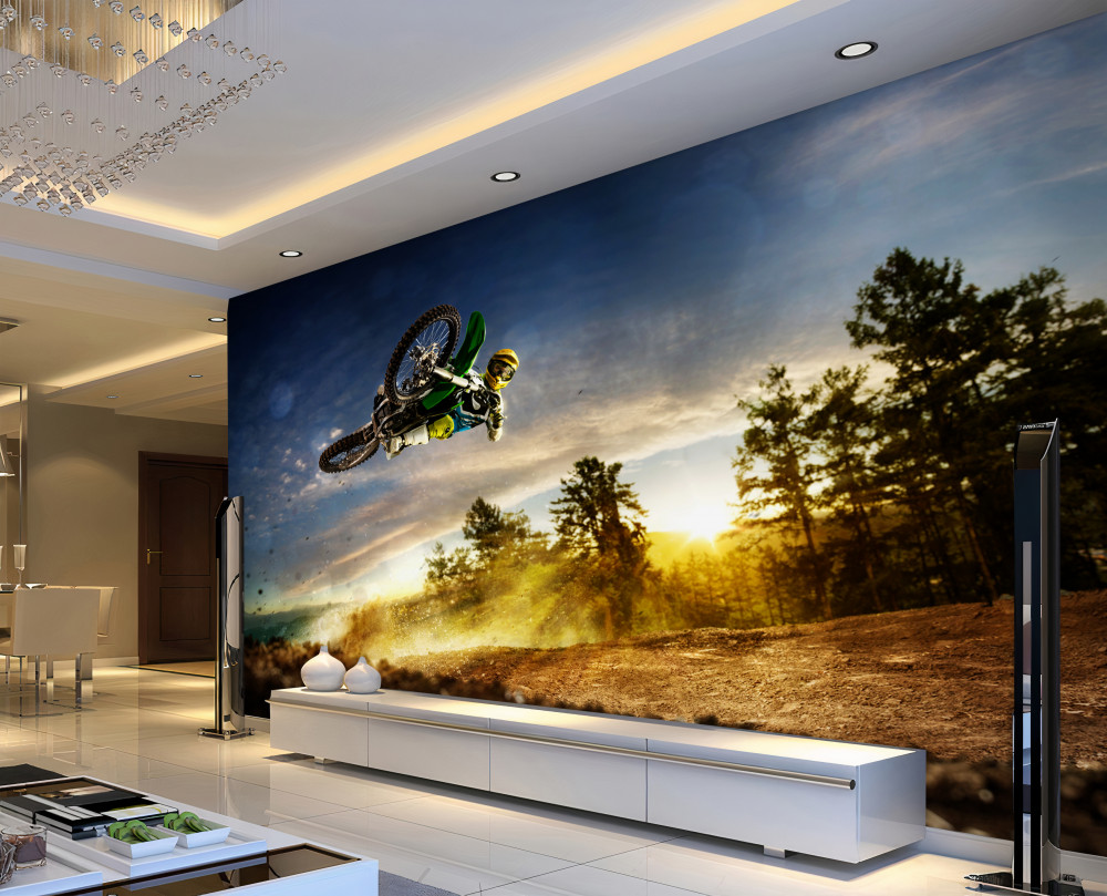 Fototapeta skok motocyklisty o zachodzie słońca