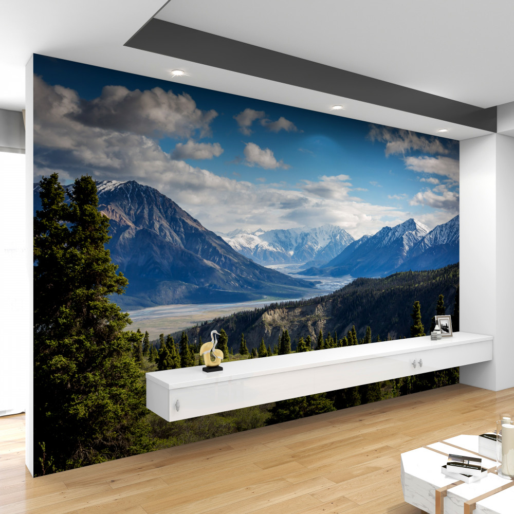 Fototapeta skraj lasu z drzewami i widokiem na góry