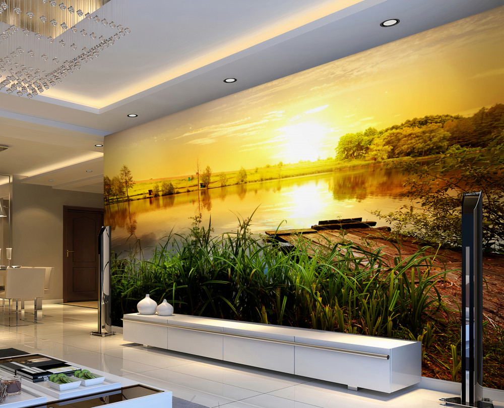 Fototapeta jasny wschód słońca nad spokojną wodą