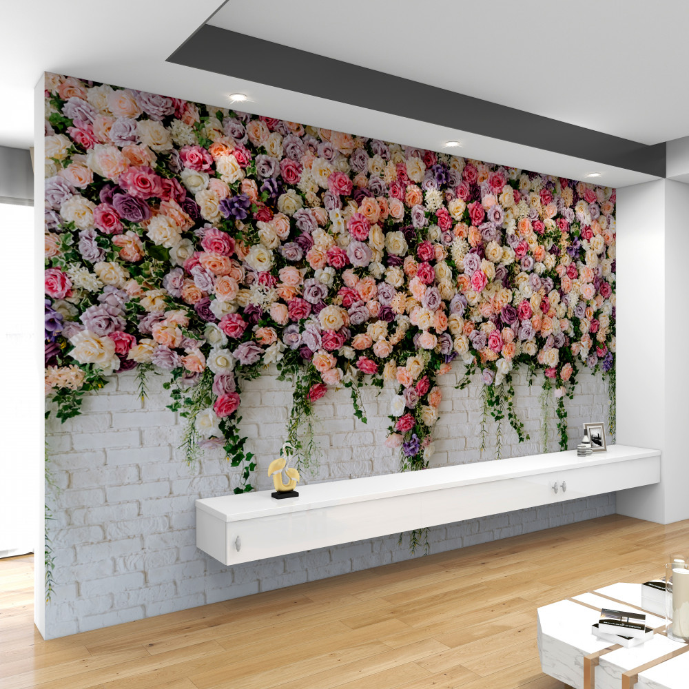 Fototapeta ceglany mur posypany sprayowymi kwiatami róż