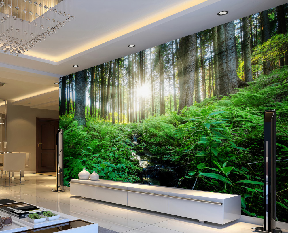 Fototapeta promienie słońca przecinają gęsty las