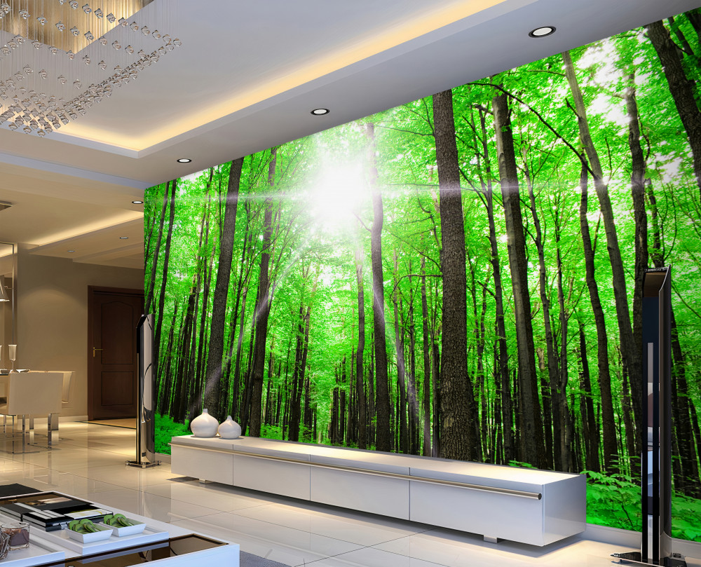 Fototapeta jasne słońce pośrodku gęstego zielonego lasu