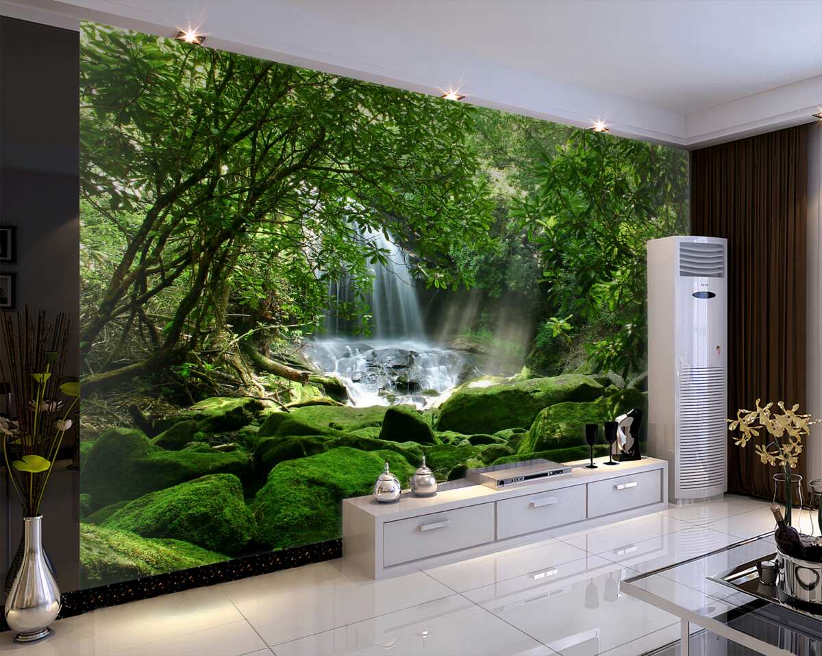 Fototapeta wodospad w gęstej zieleni i drzewach