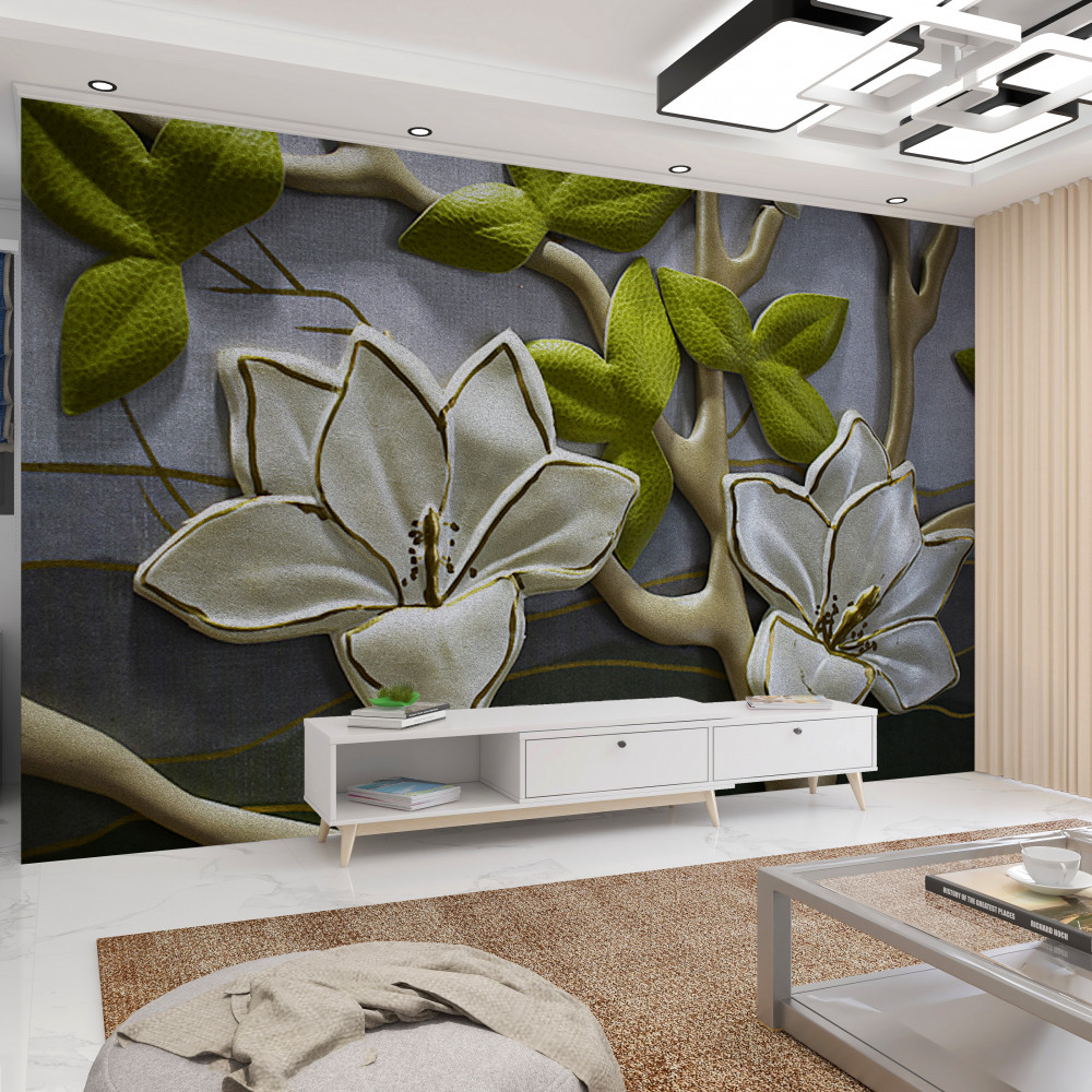 Fototapeta porcelanowe kwiaty magnolii na zielonych gałęziach