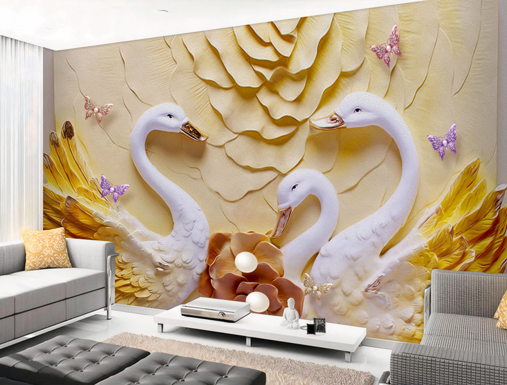 Fototapeta białe łabędzie ze złotymi skrzydłami