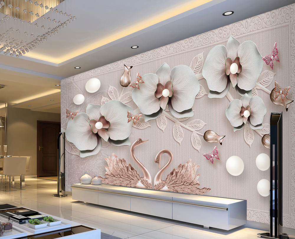 Fototapeta złote łabędzie na wodzie z kwiatami