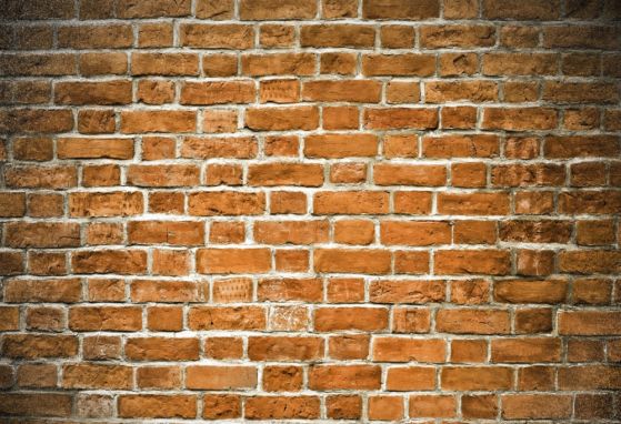 Fototapeta brązowy mur z cegły