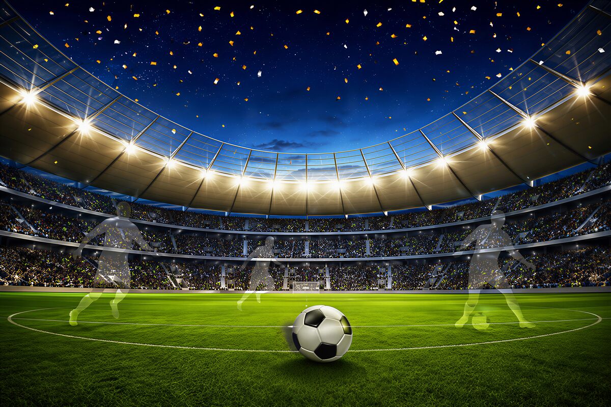 Fototapeta stadion piłkarski z piłką o zachodzie słońca do pokoju fana futbolu
