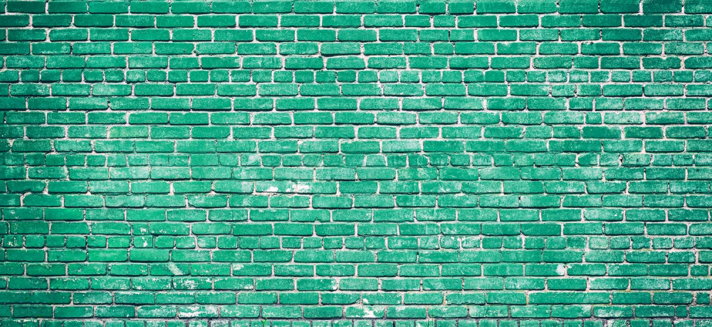 Fototapeta turkusowy mur z cegły