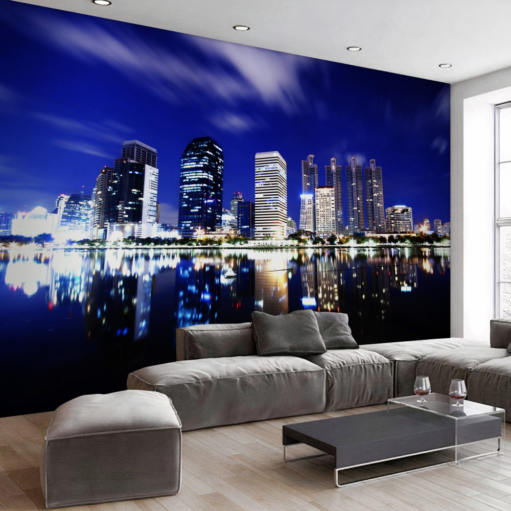 Fototapeta nocny drapacz chmur w odbiciu wody