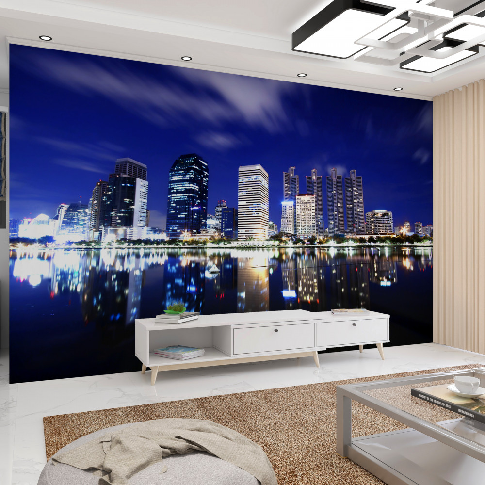 Fototapeta nocny drapacz chmur w odbiciu wody