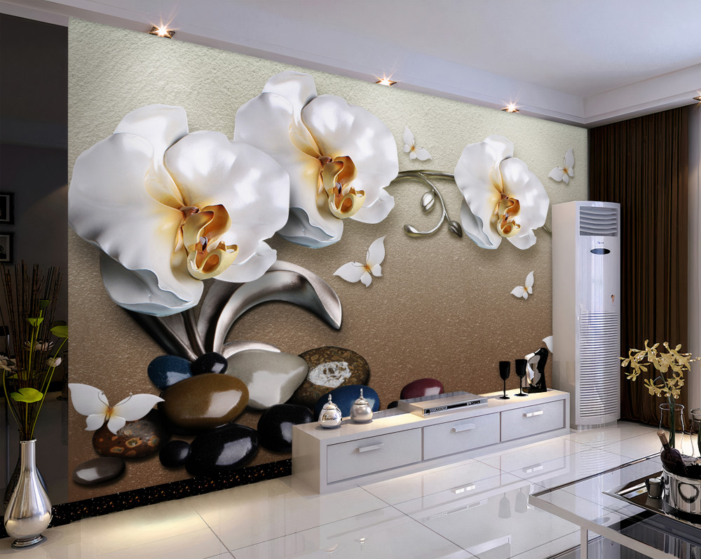 Fototapeta białe orchidee przedostają się przez kamienie