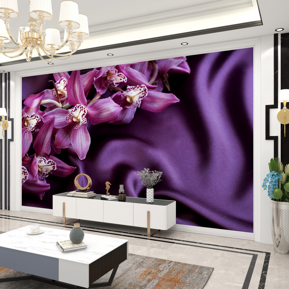 Fototapeta fioletowe orchidee na fioletowej satynowej tkaninie