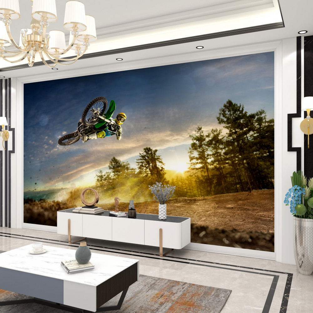 Fototapeta skok motocyklisty o zachodzie słońca