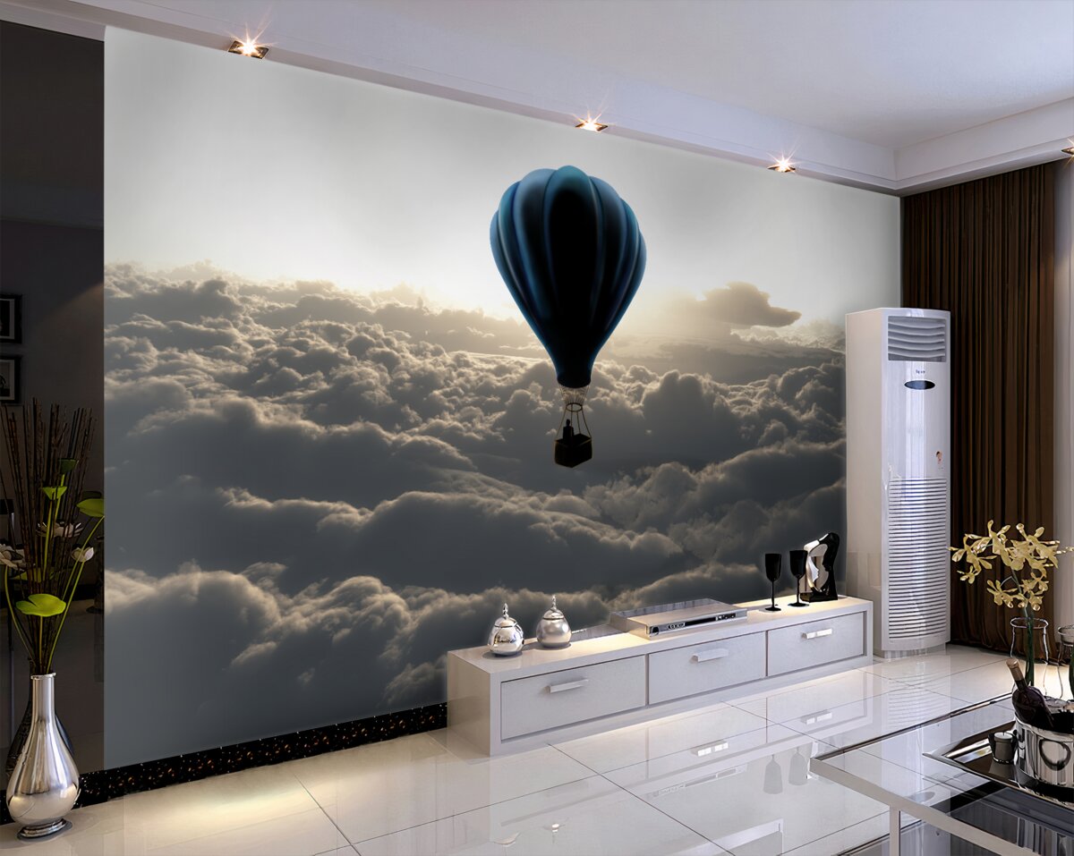 Fototapeta balon na ogrzane powietrze unosi się nad grubymi chmurami