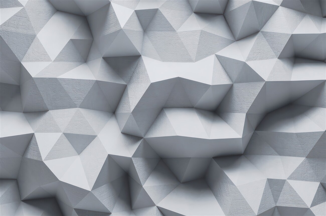 Fototapeta Obszerna szara ściana w geometrii