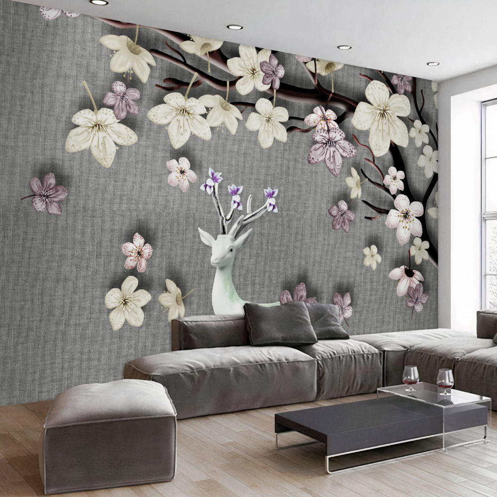Fototapeta biały jeleń i kwitnące gałęzie magnolii