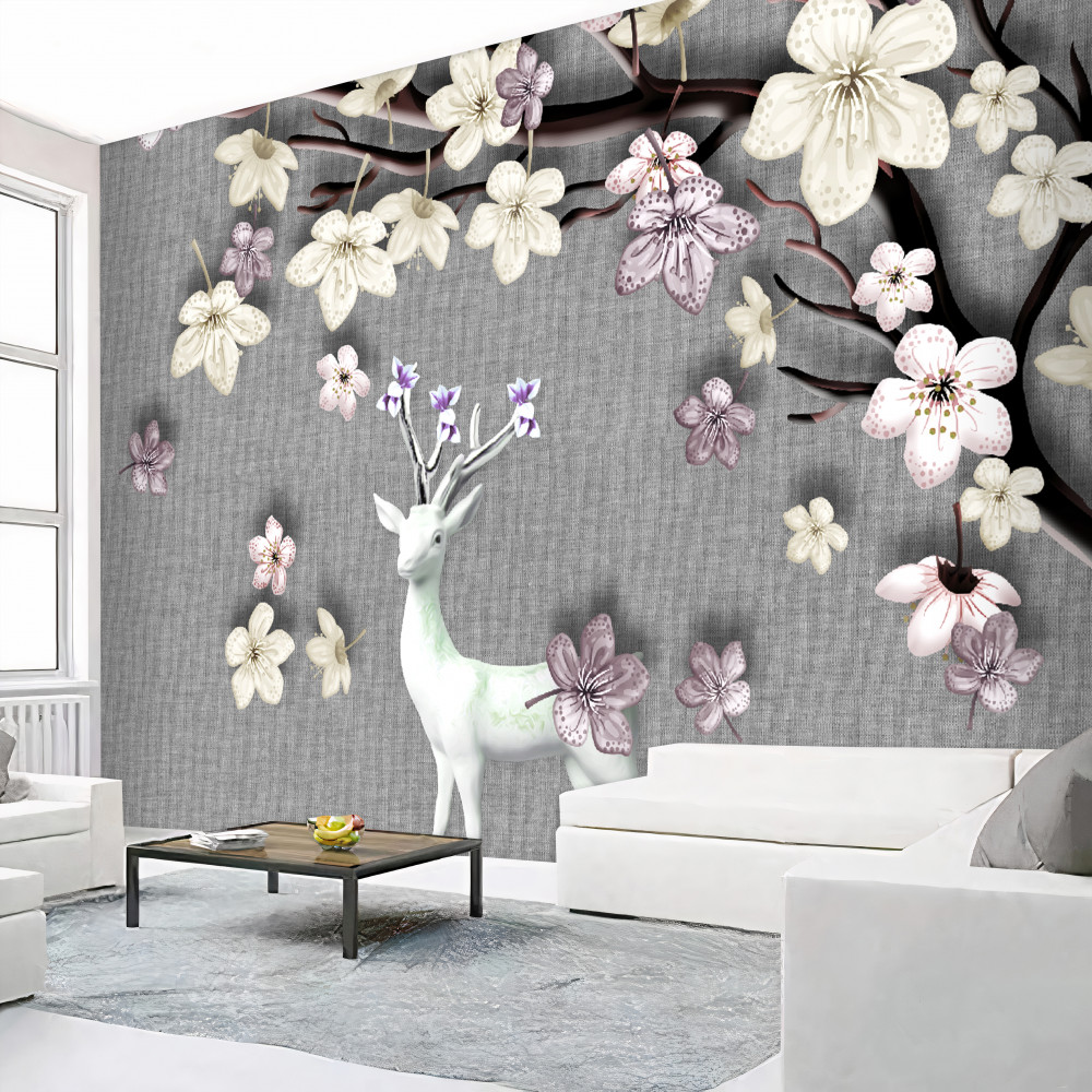 Fototapeta biały jeleń i kwitnące gałęzie magnolii
