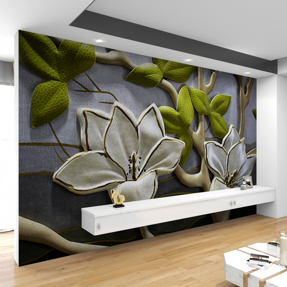 Fototapeta porcelanowe kwiaty magnolii na zielonych gałęziach