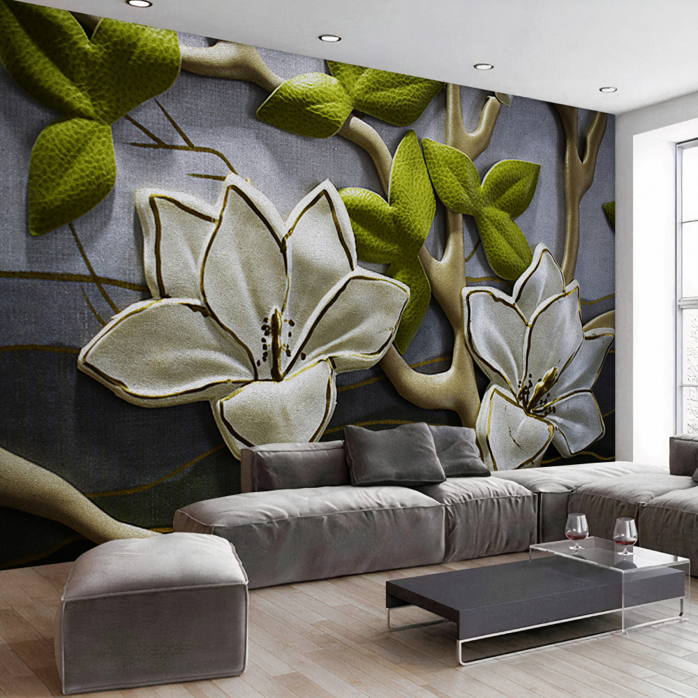 Fototapeta porcelanowe kwiaty magnolii na zielonych gałęziach